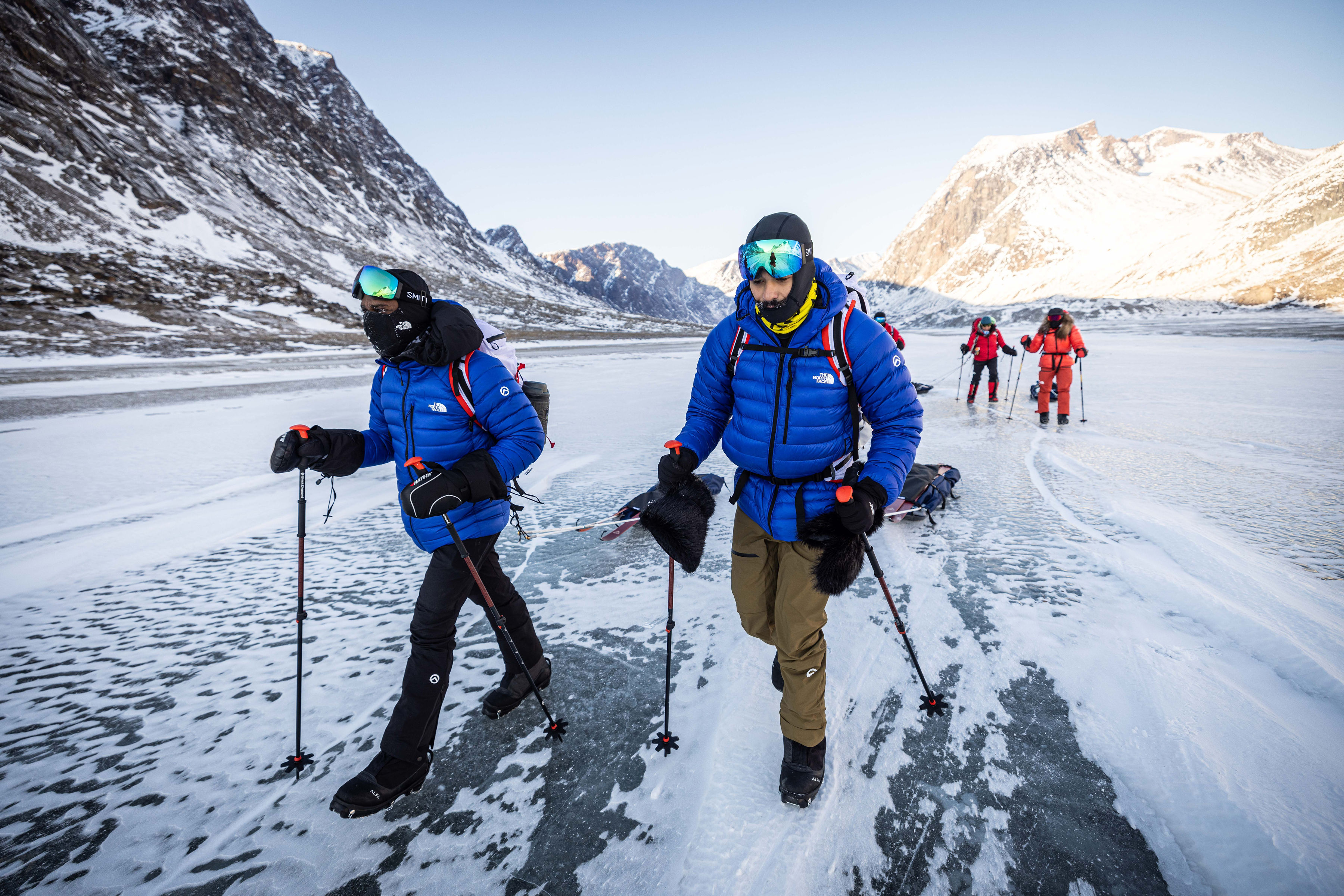 men walking in the vast Arctic